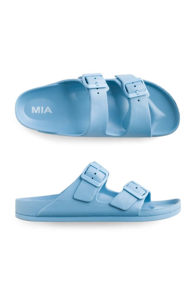 Stitch Fix women’s blue two-strap buckle slide sandals.