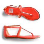 Stitch Fix women’s red sandals with metallic details.