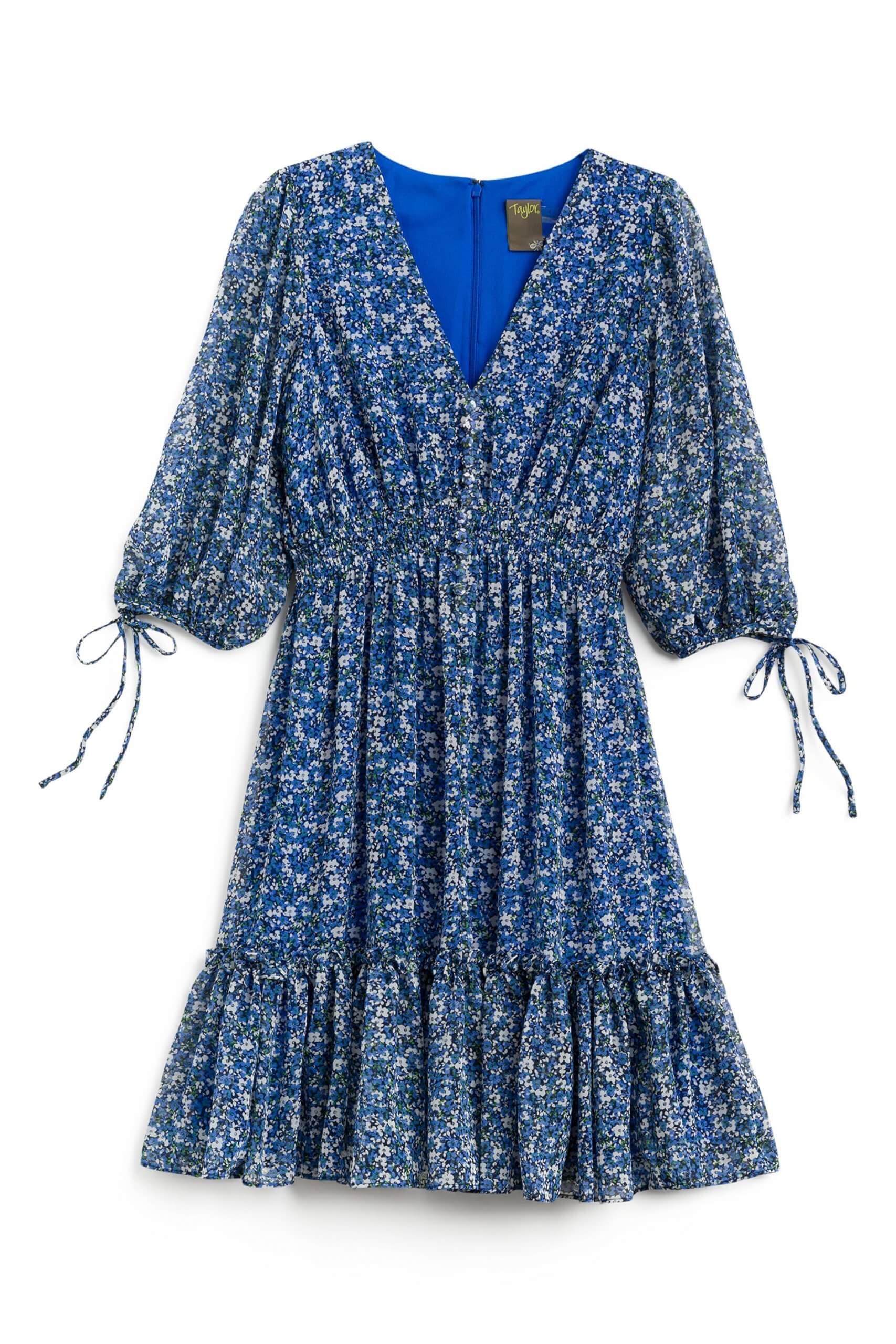 Stitch Fix women’s blue micro-floral tiered dress with tied balloon sleeves.