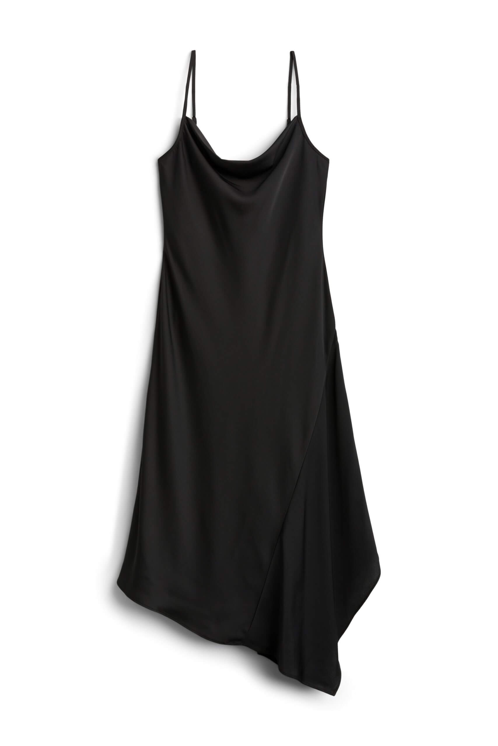Stitch Fix women’s black slip dress with asymmetrical hem.
