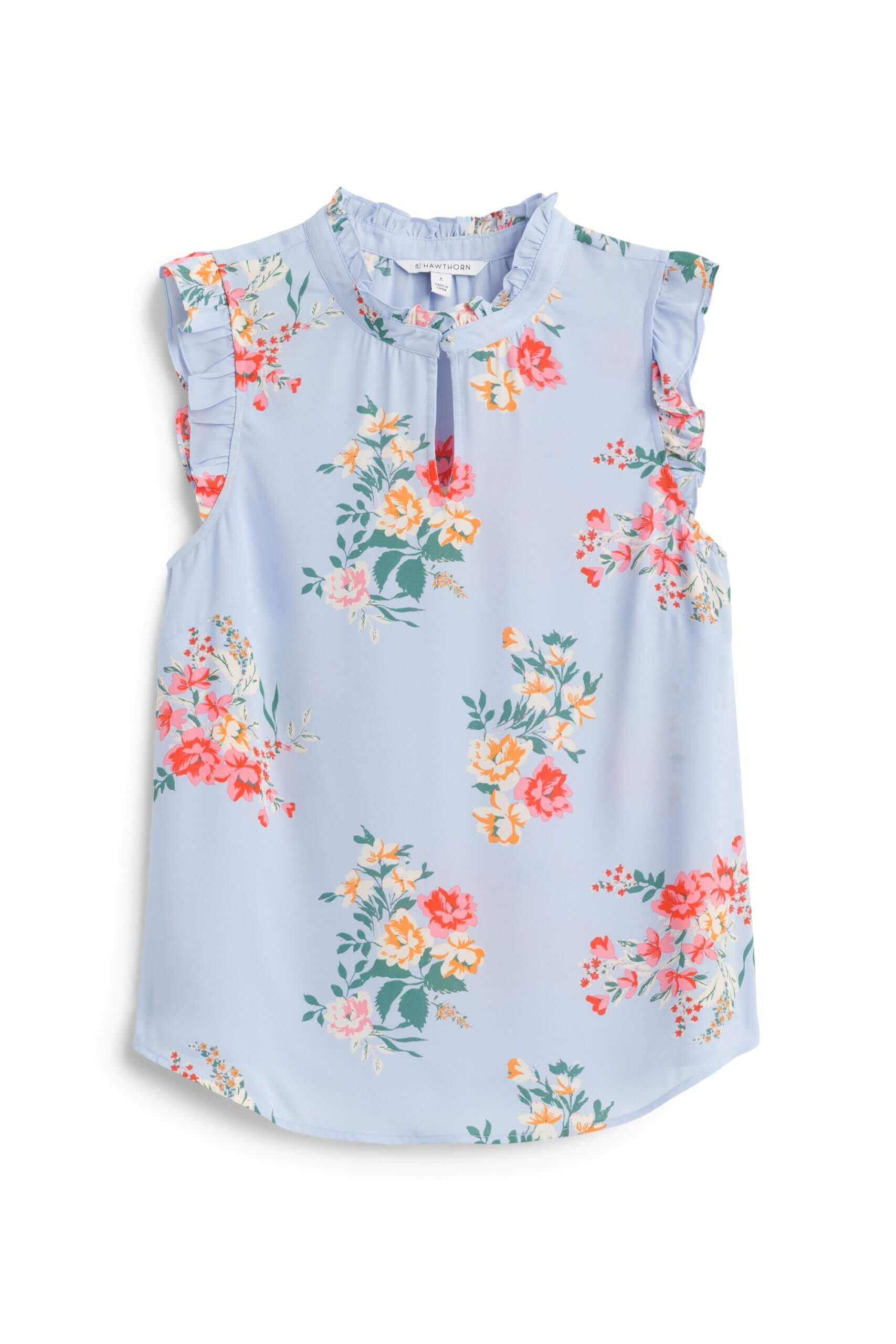Stitch Fix women’s light blue blouse with pink, yellow, white and green floral print with ruffle neckline and shoulder detail.