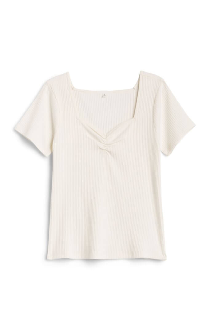 Stitch Fix women’s white short-sleeve sweetheart neckline top.