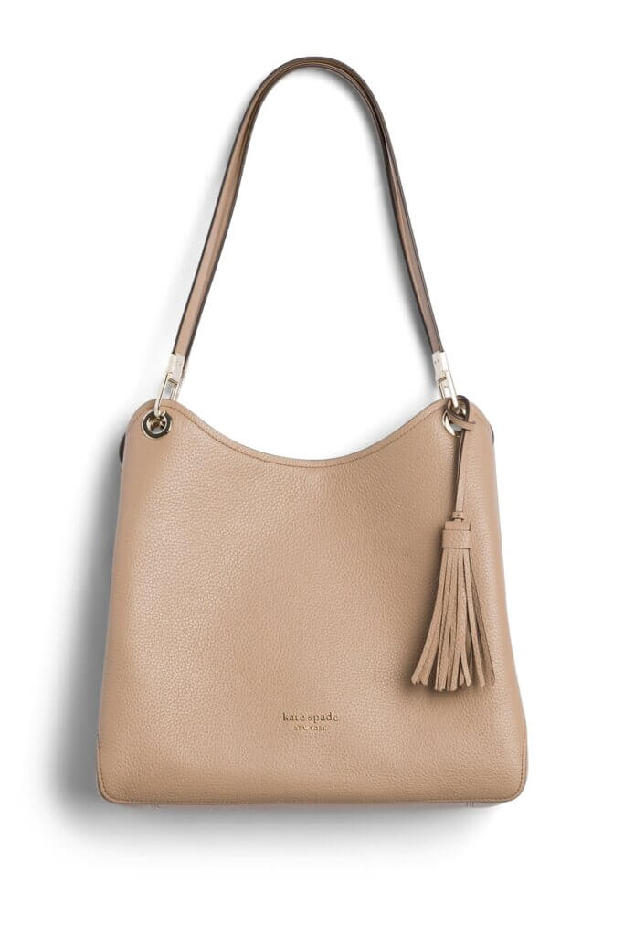 Stitch Fix women’s blush leather tote bag with tassel and silver hardware.