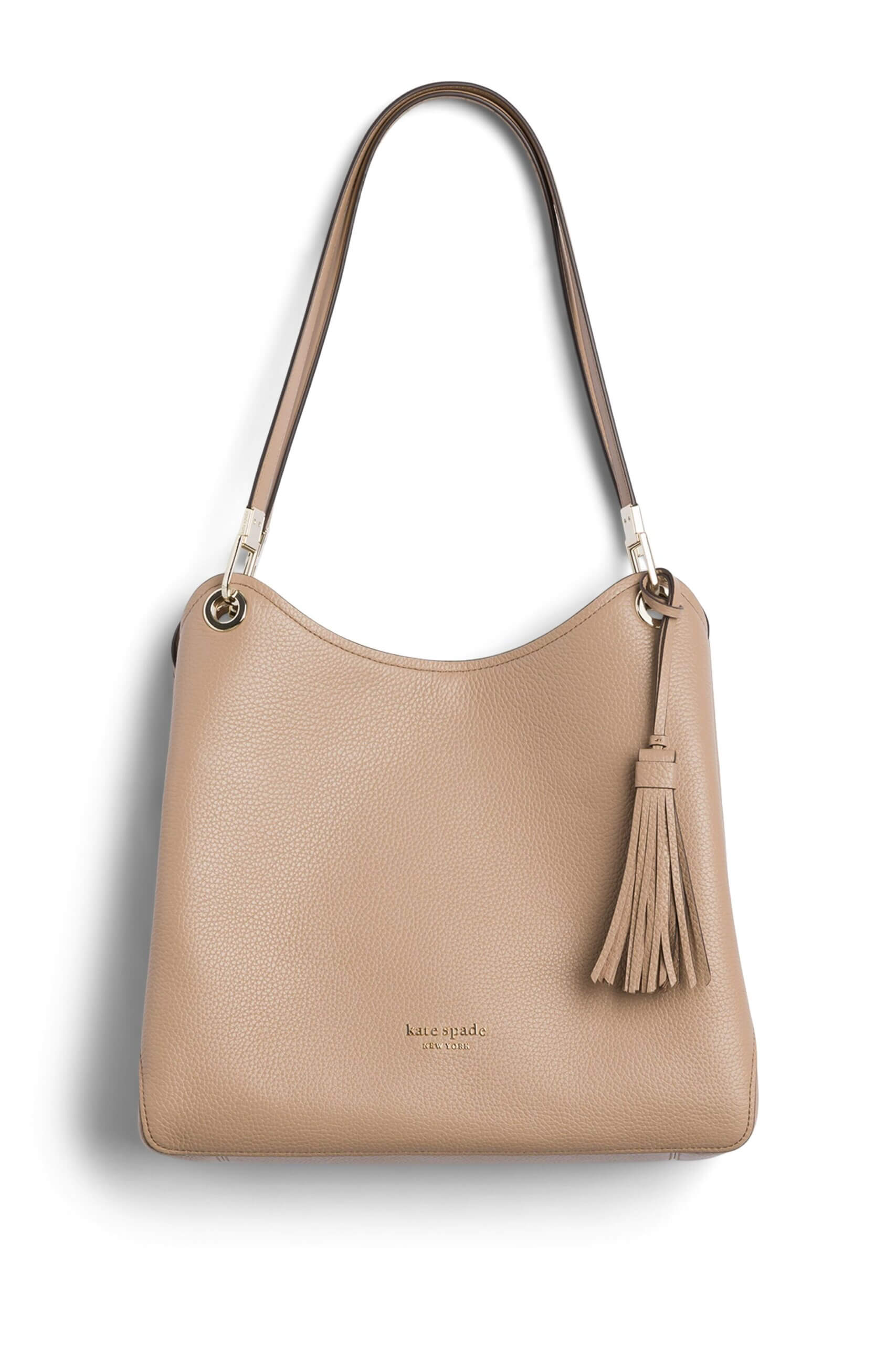 Stitch Fix women’s blush leather tote bag with tassel and silver hardware.