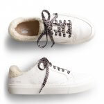 Stitch Fix women’s white sneakers with bouclé lining and grey zebra striped laces.