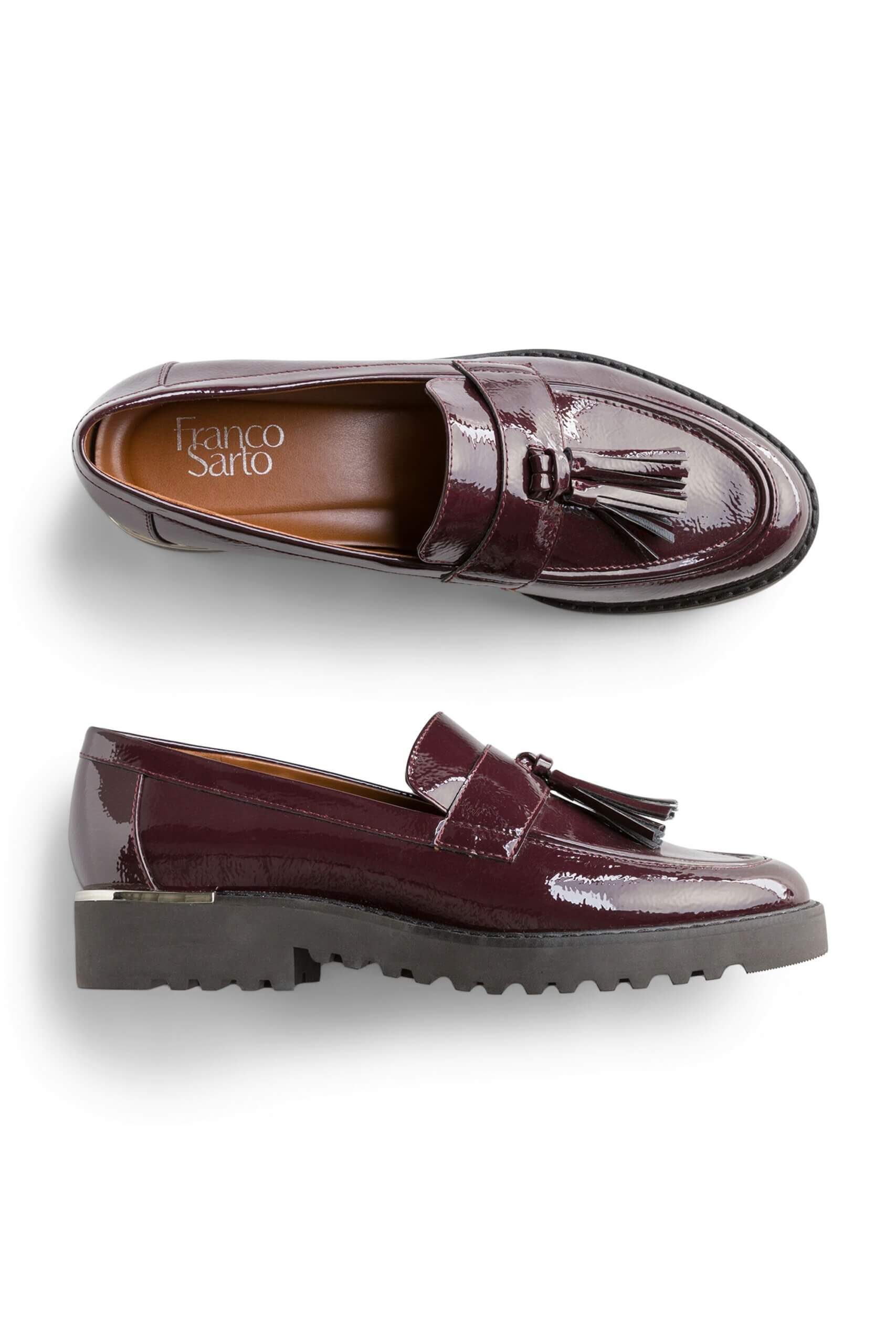 Stitch Fix women’s burgundy patent-leather tassel loafers with black platform lug sole and silver accents.