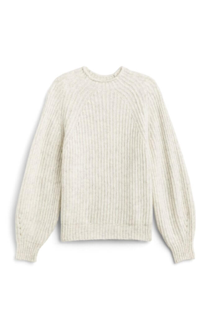 Stitch Fix women’s off-white sweater with balloon sleeve detail.