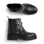 Stitch Fix women’s black leather Chelsea boots with silver chain.