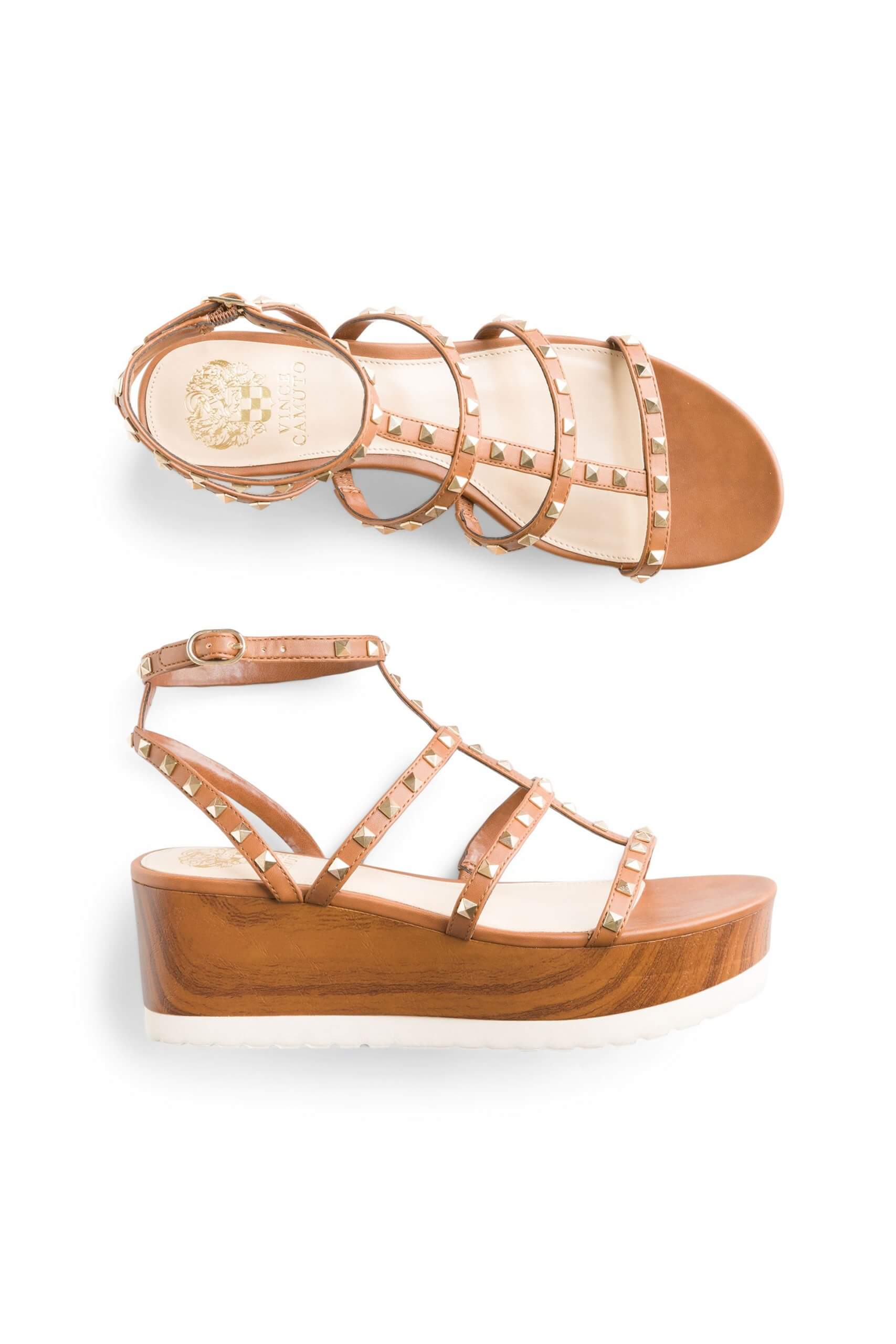 Stitch Fix women’s wooden platform sandals with gold stud detail.