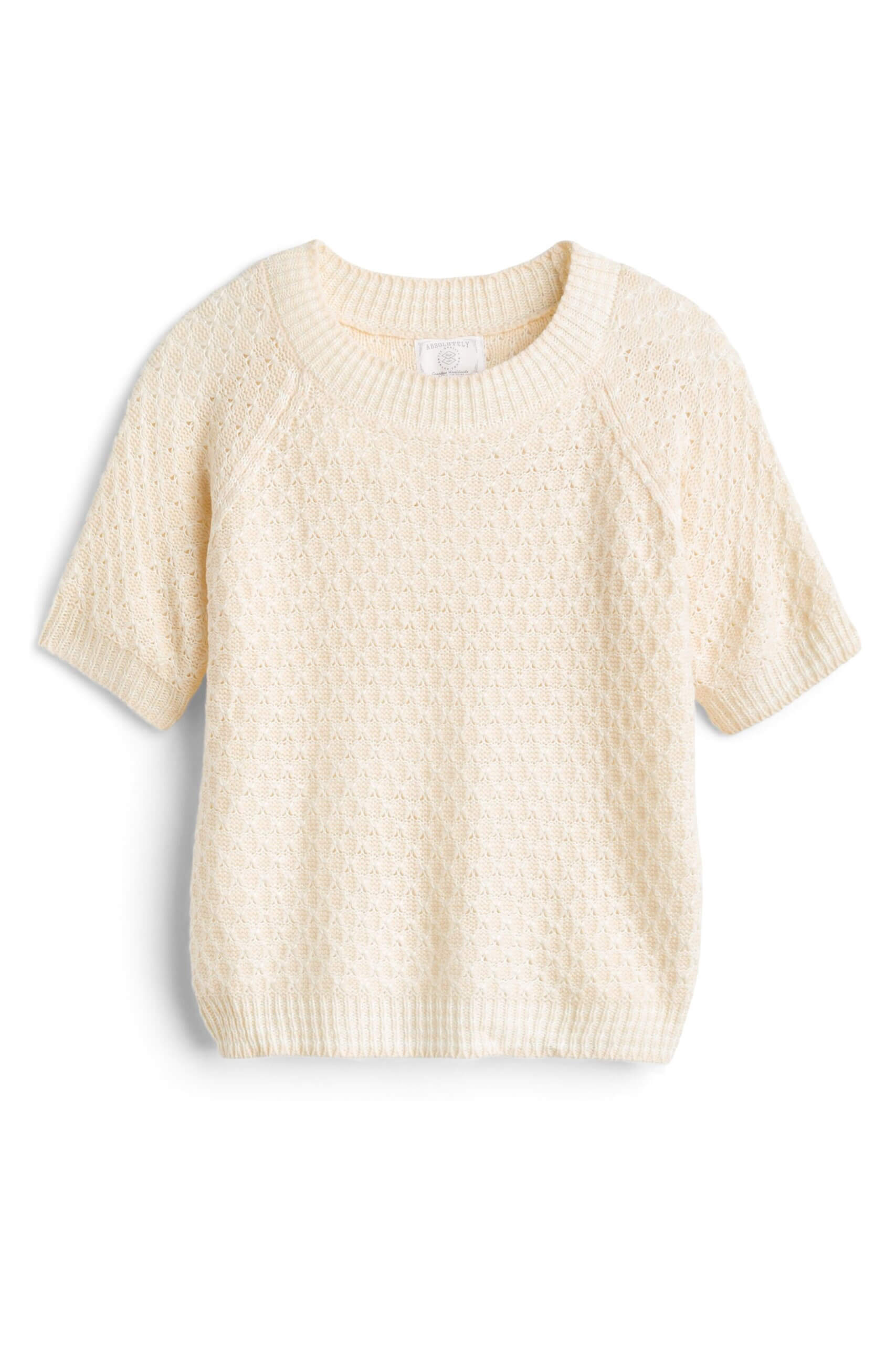 Stitch Fix women’s cream short sleeve, textured sweater.