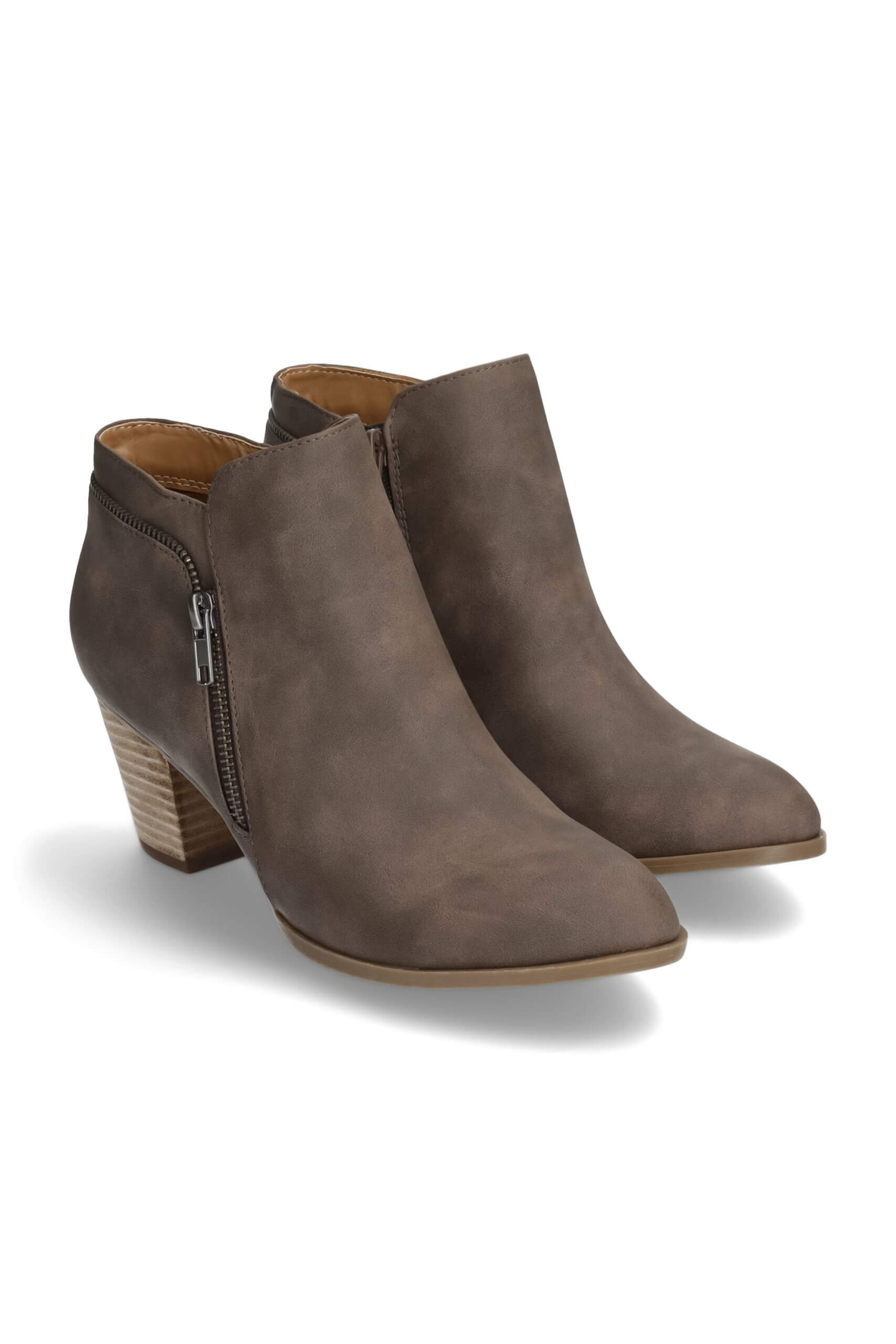Stitch Fix women's brown heeled ankle booties.