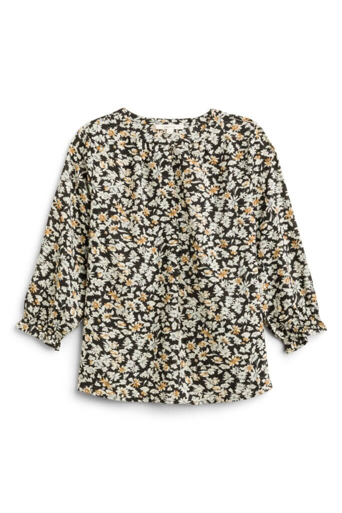 Stitch Fix women’s ditsy floral blouse with three-quarter length sleeves.