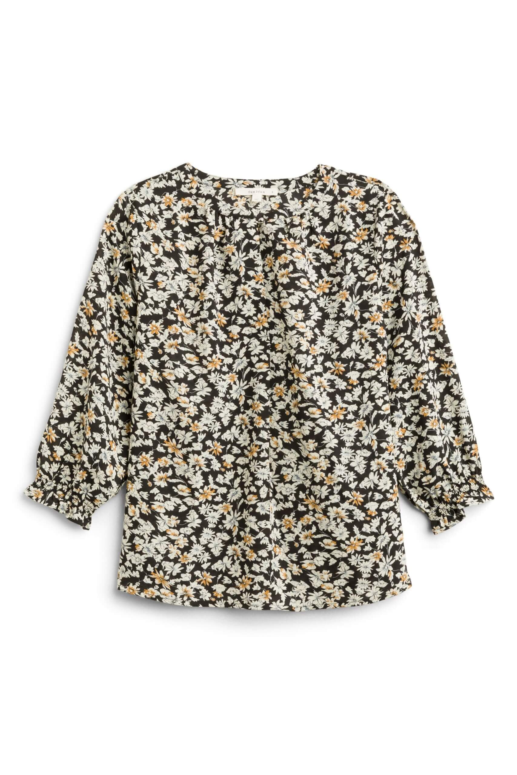 Stitch Fix women’s ditsy floral blouse with three-quarter length sleeves.