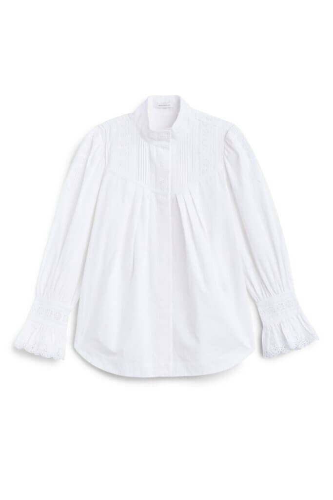 Stitch Fix women’s white blouse with puff sleeve detail.