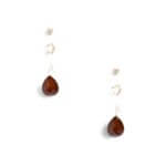 Stitch Fix women’s gold earring set with post, small hoops and burgundy drop earrings.