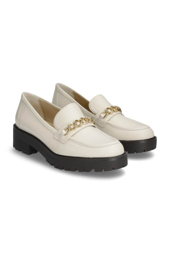 Stitch Fix women’s white loafers with black lug soles and gold chain.