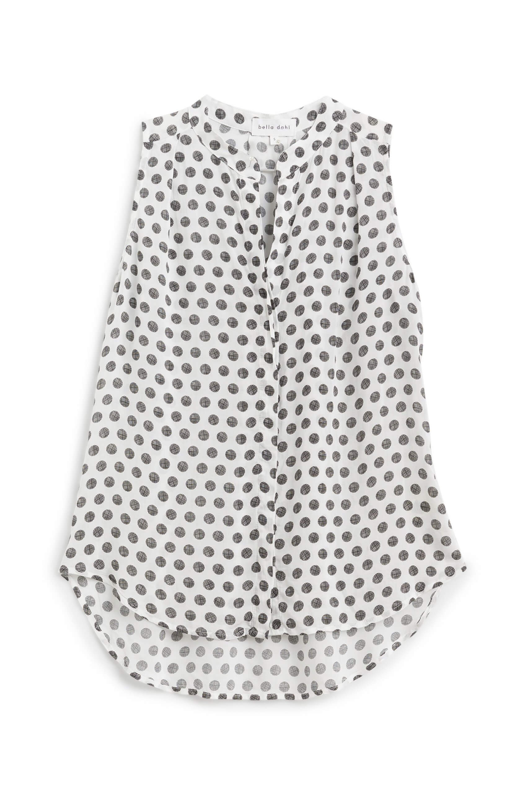 Stitch Fix Women’s white sleeveless blouse with black dots.