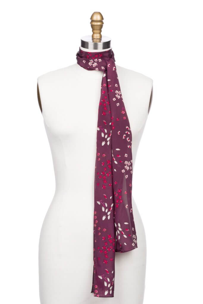 Stitch Fix women’s pink, purple and white floral print scarf on bust form.