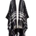 Stitch Fix women’s black and white oversized blanket scarf with fringe ends on bust form.