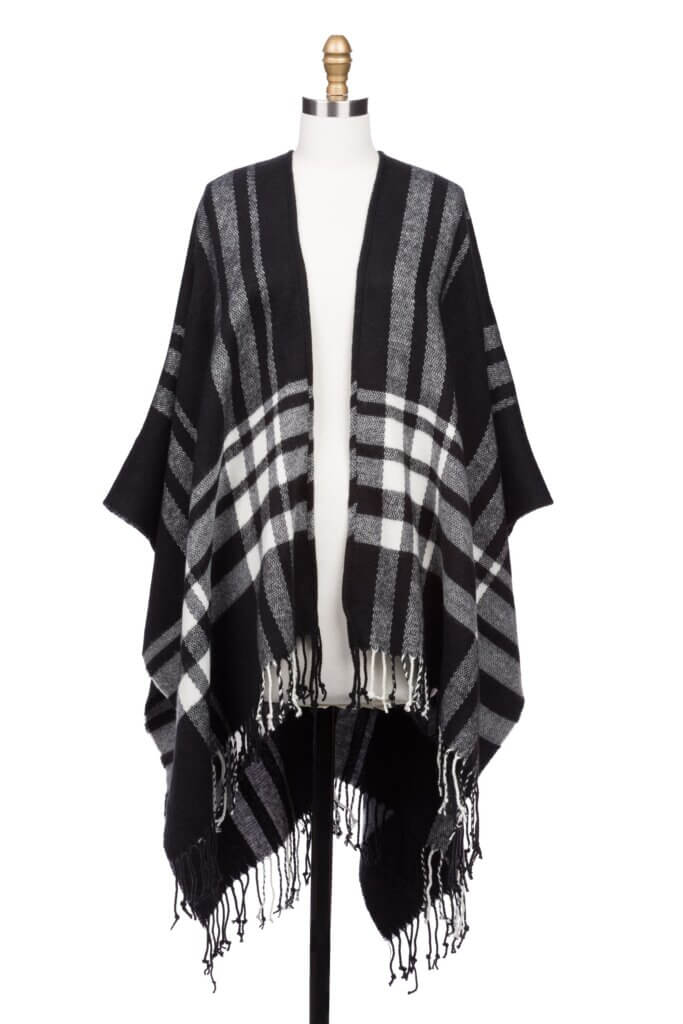 Stitch Fix women’s black and white oversized blanket scarf with fringe ends on bust form.