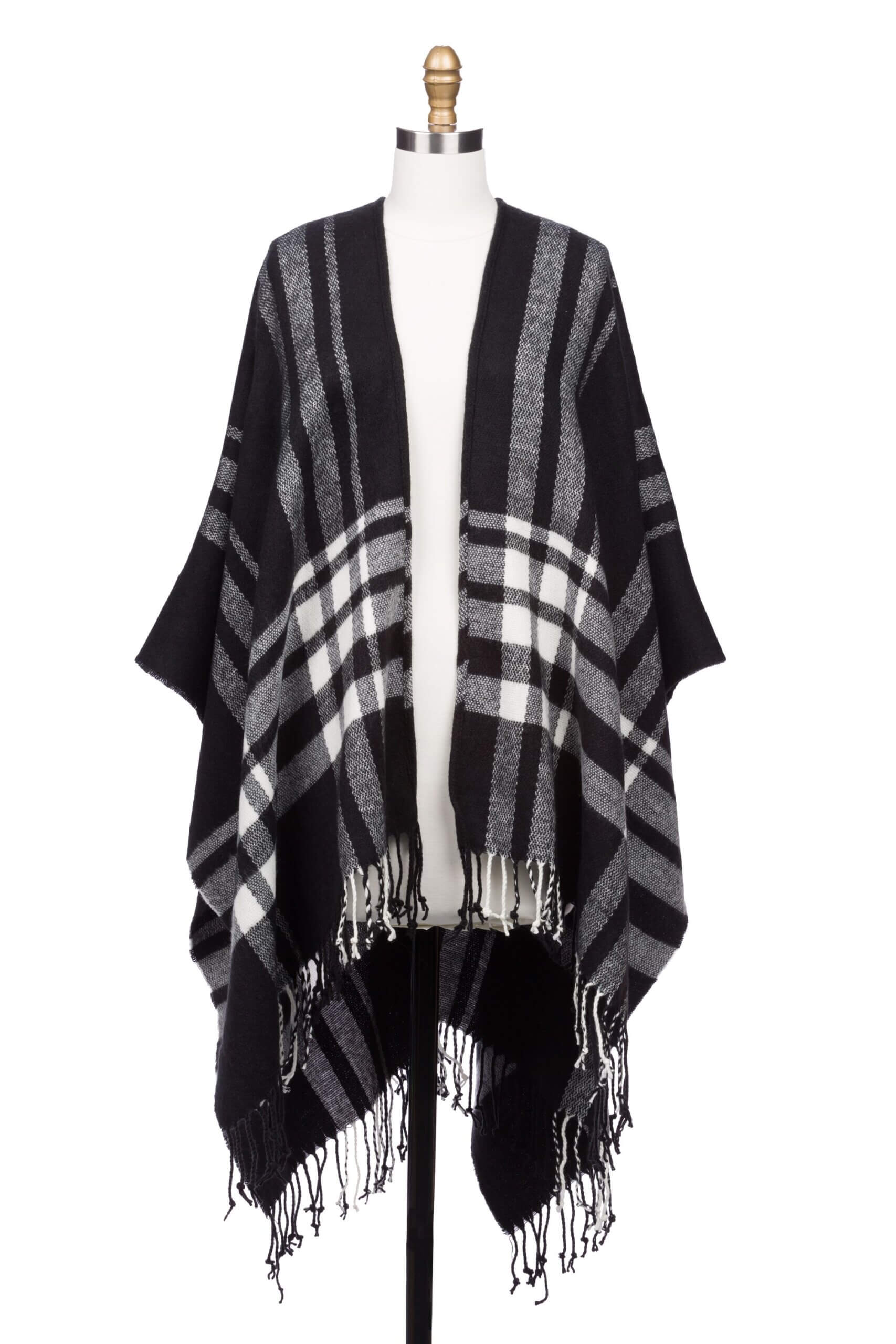 Stitch Fix women’s black and white oversized blanket scarf with fringe ends on bust form.