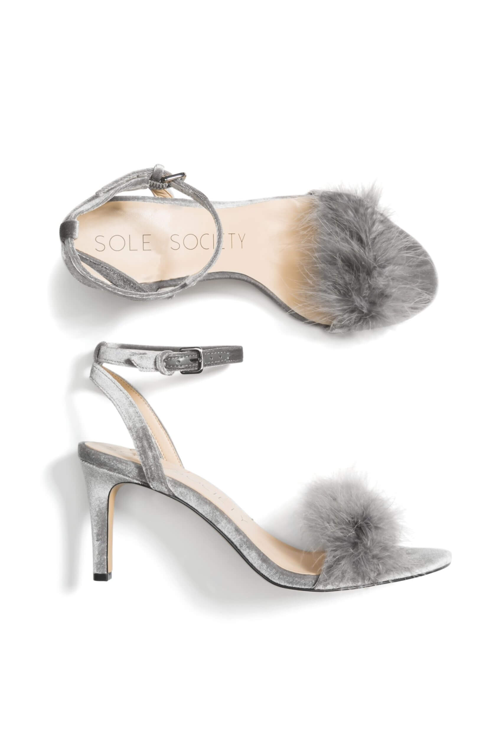 Stitch Fix women’s silver heels with faux fur pom-pom detail.