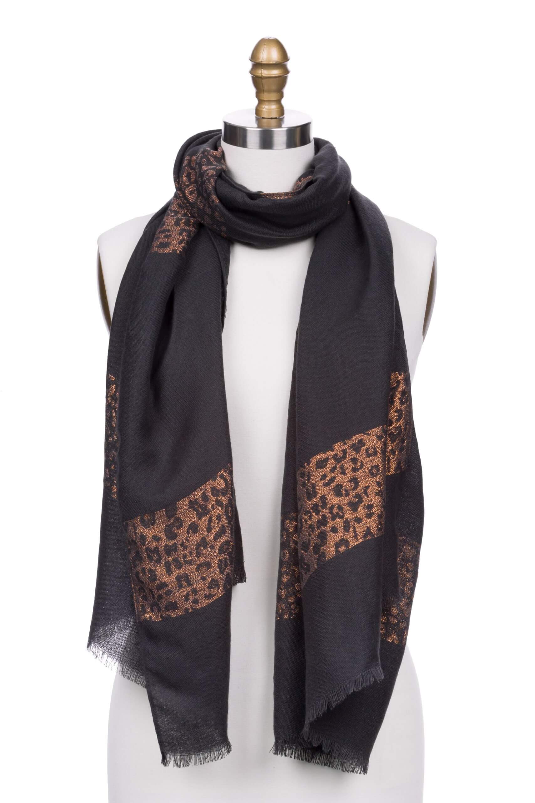 Stitch Fix women's black and leopard print color block woven scarf on bust form.