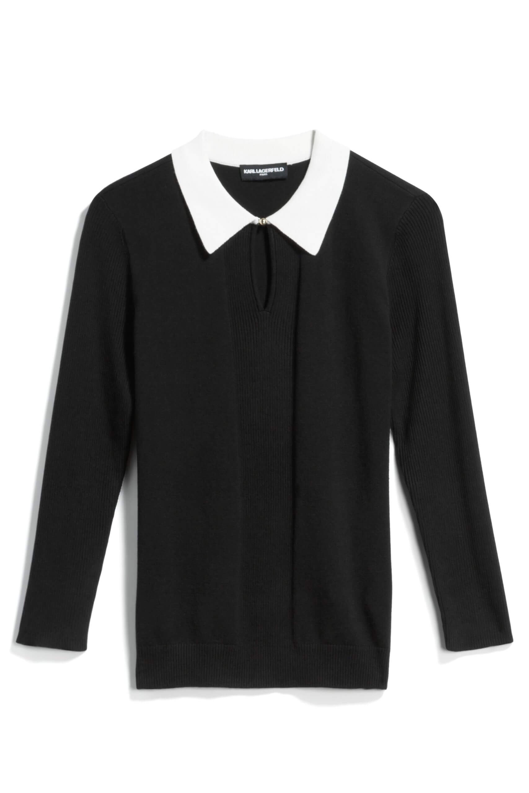 Stitch Fix women’s black sweater with white collar.