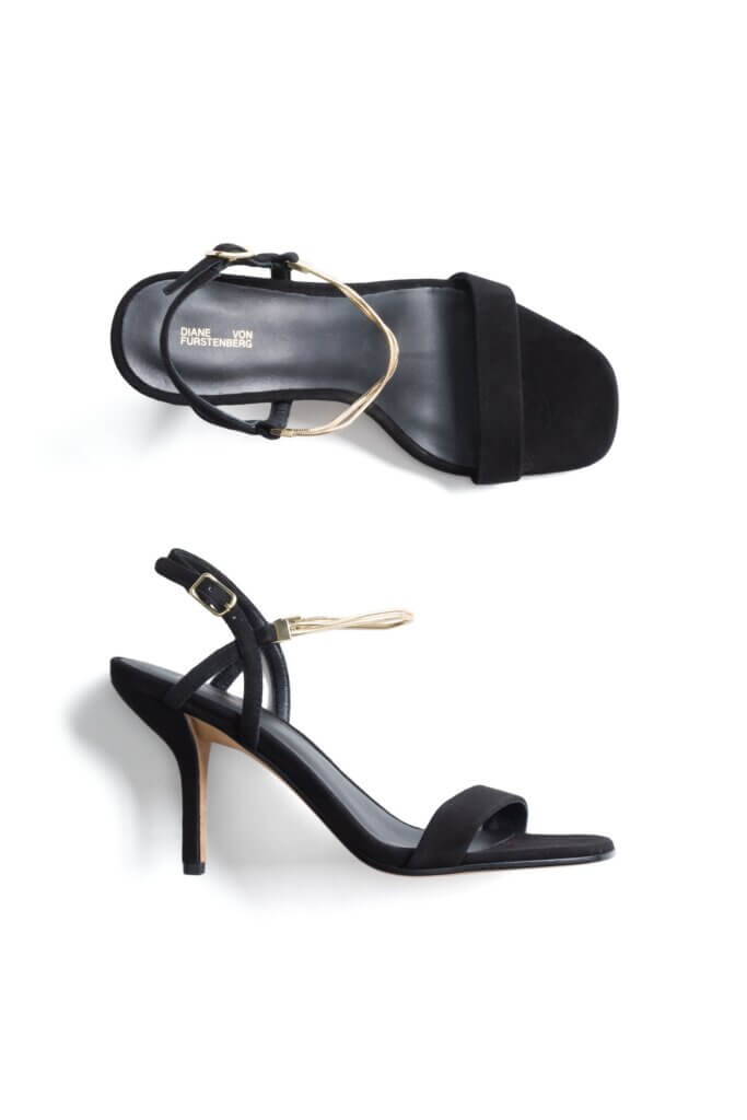 Stitch Fix women’s black strappy heels with gold accents.