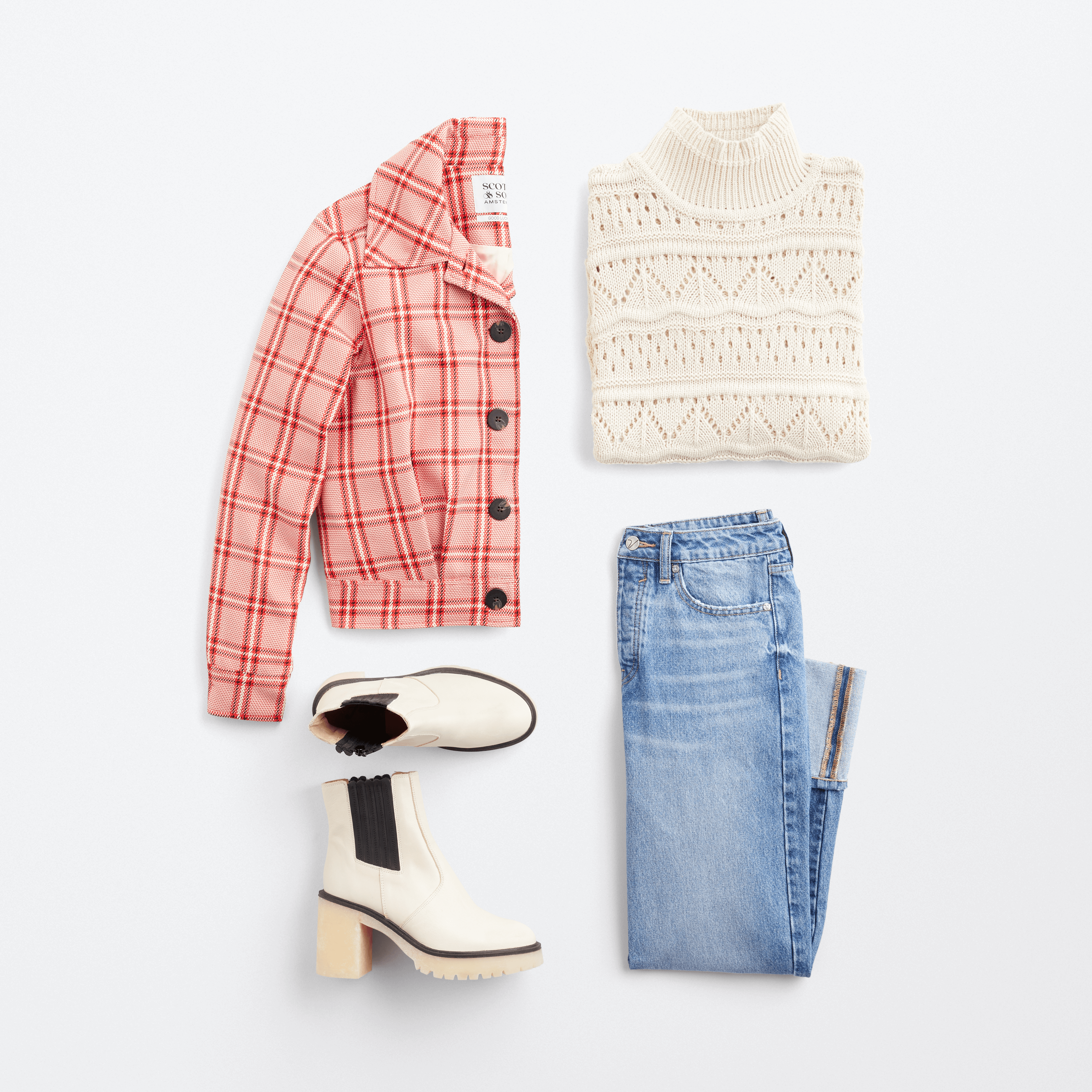 Stitch Fix Women’s cozy fall aesthetic outfit with white Fair Isle sweater, red plaid jacket, blue jeans and white boots.