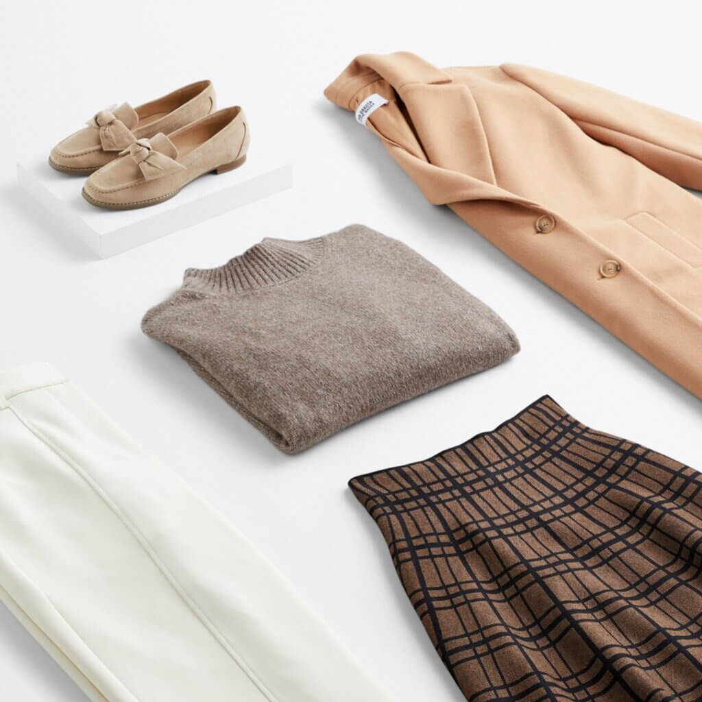 Stitch Fix Women’s collegiate fashion outfit with mock neck sweater, plaid skirt, trousers, trench coat and loafers.