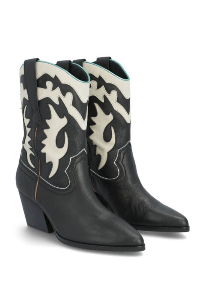 Stitch Fix Women’s black and white cowboy boots.