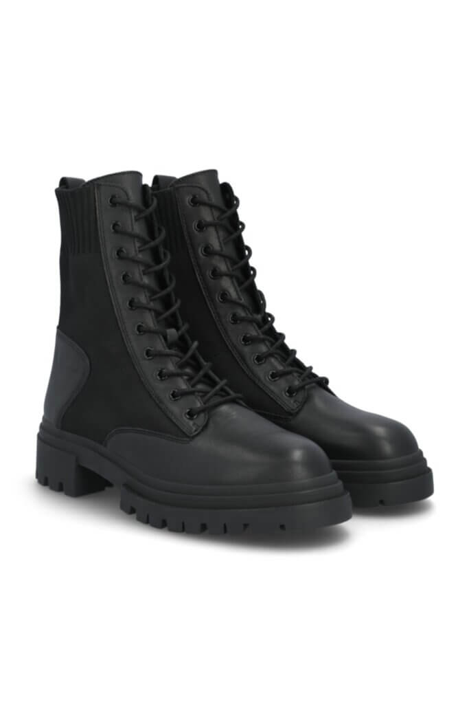 Stitch Fix Women’s black lug-sole combat boots.