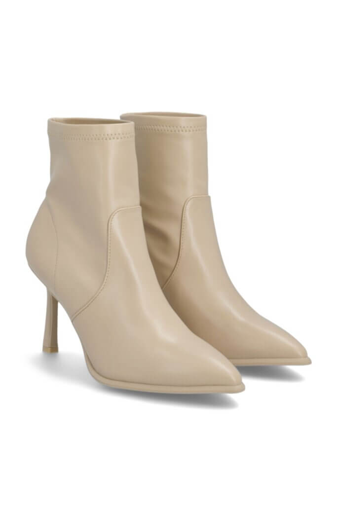Stitch Fix Women’s off-white pointed-toe heeled booties.
