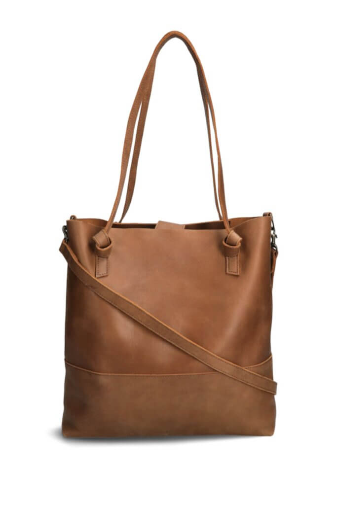 Stitch Fix Women’s brown leather oversized collegiate fashion tote bag with crossbody strap.