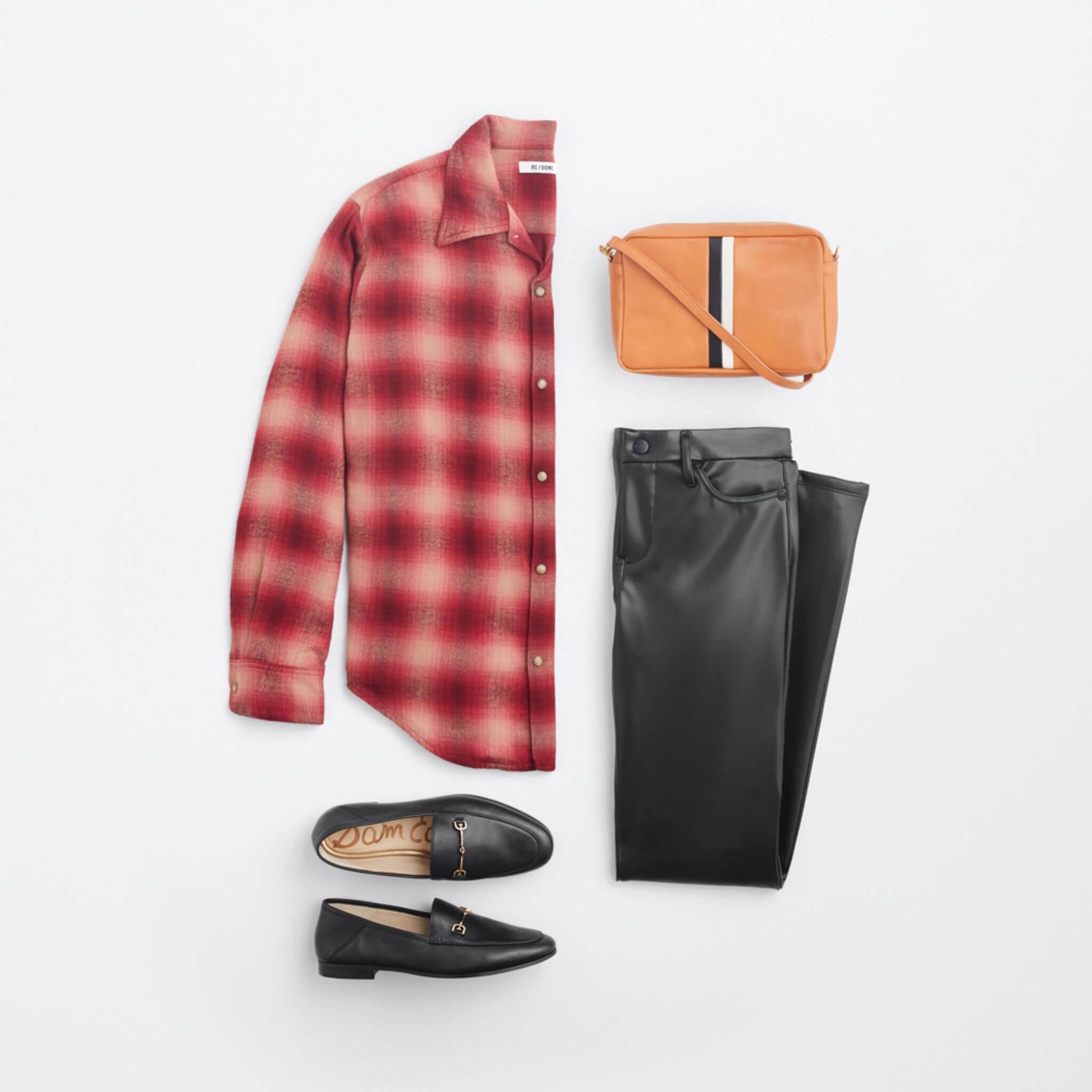 Stitch Fix Women’s grunge style outfit with red plaid shirt, black leather pants, black loafers and tan crossbody purse.