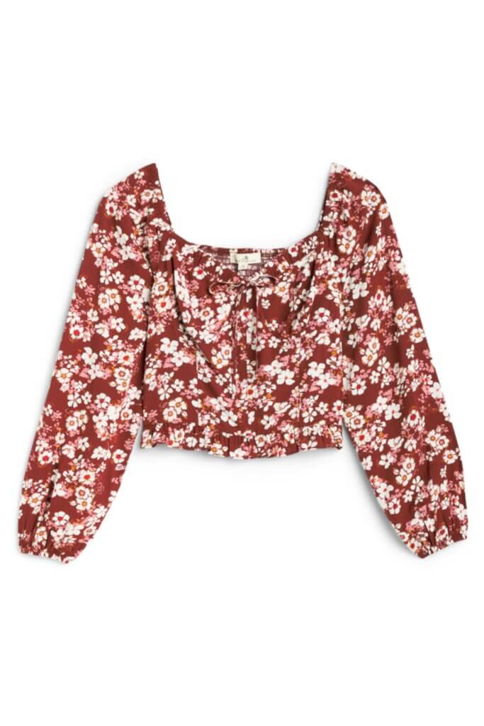 Stitch Fix Women’s burgundy and white long-sleeve floral crop top.