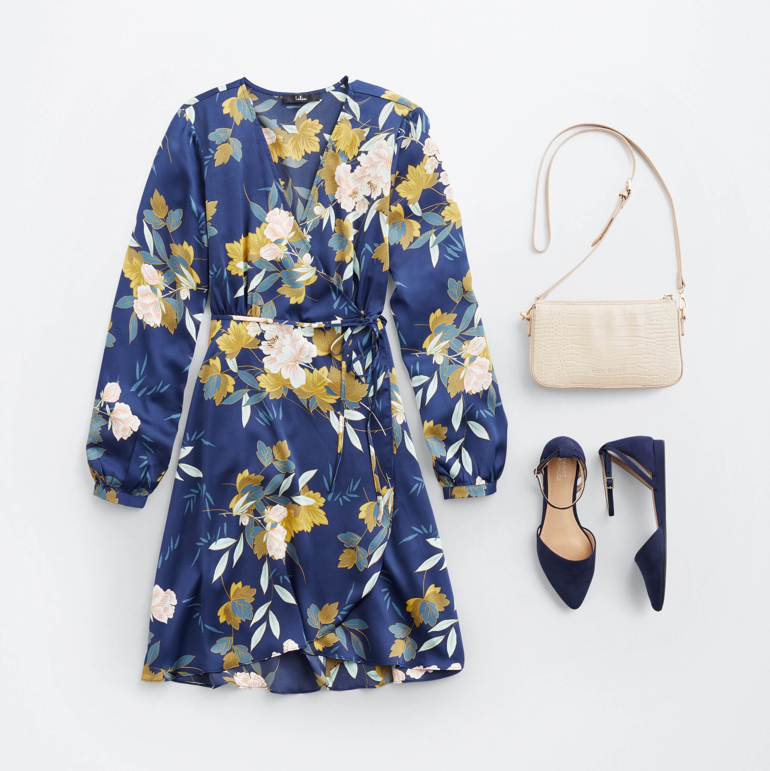 Stitch Fix women's outfit laydown featuring blue floral dress, blue ankle strap flats and white crossbody purse.