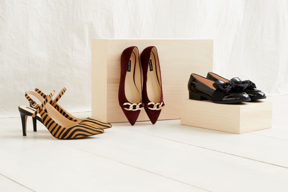 Stitch Fix women’s business formal shoes with tiger print heels, burgundy flats and black loafers on boxes.