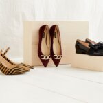 Stitch Fix women’s business formal shoes with tiger print heels, burgundy flats and black loafers on boxes.