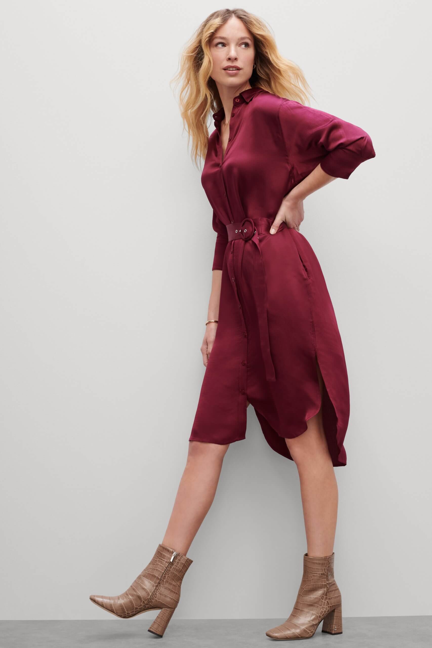 Stitch Fix women’s model wearing burgundy three-quarter sleeve shirt dress and light brown heeled booties.