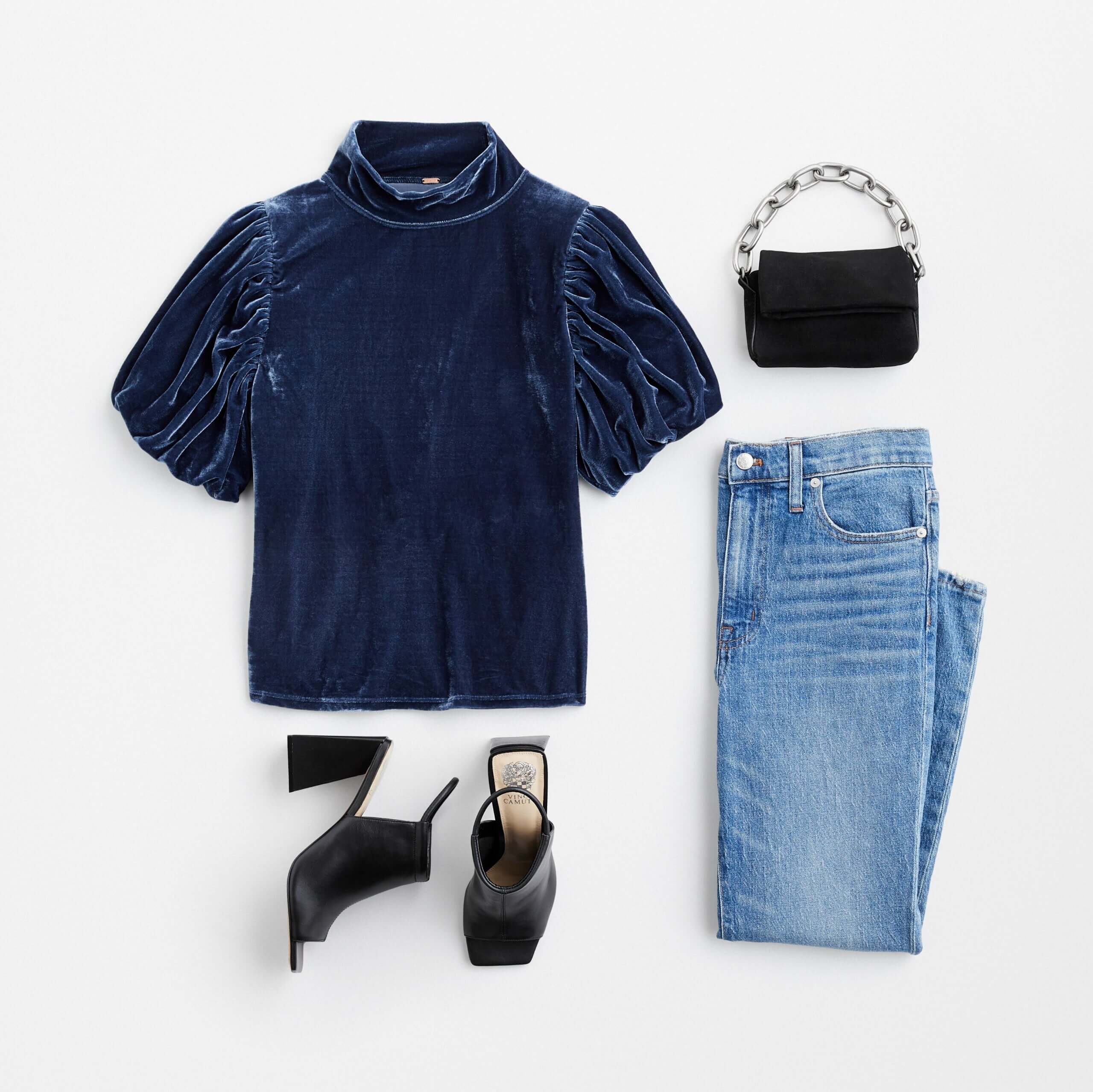 Stitch Fix women's outfit laydown featuring royal blue velvet shirt, blue jeans, black heeled sandals and black purse.