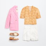 Stitch Fix women's picnic outfit featuring pink blazer, orange printed blouse, white shorts and brown loafers.
