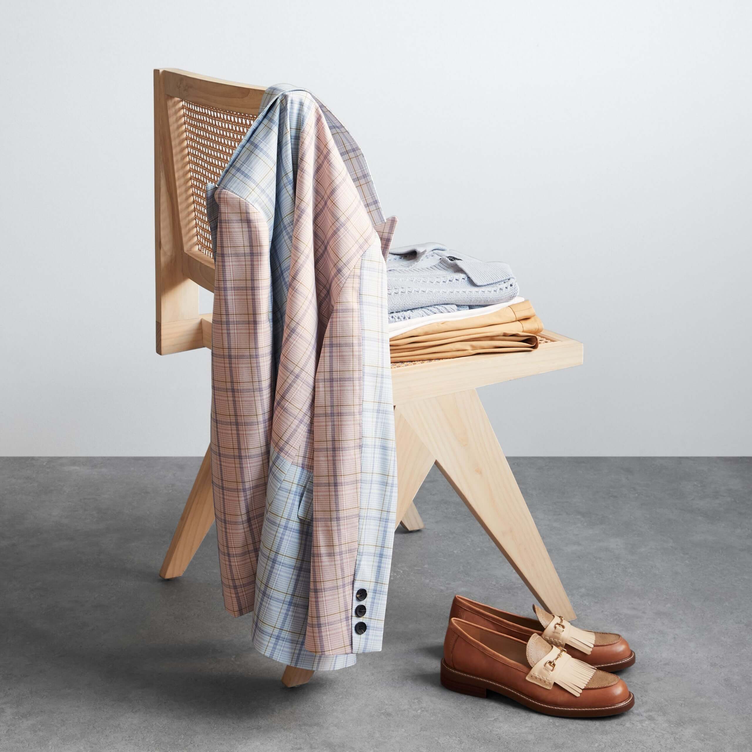 Stitch Fix women's business professional attire featuring a plaid blazer, pants, collared shirt and loafers.
