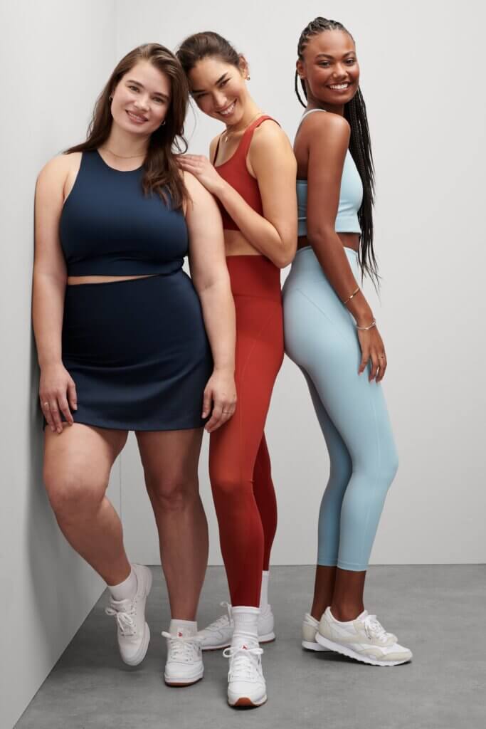 Stitch Fix women’s models wearing tennis skirt outfit and matching bra and legging sets.