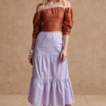 Stitch Fix women’s Bridgerton inspired outfit featuring lavender tiered midi skirt and brown off-the-shoulder smocked top.