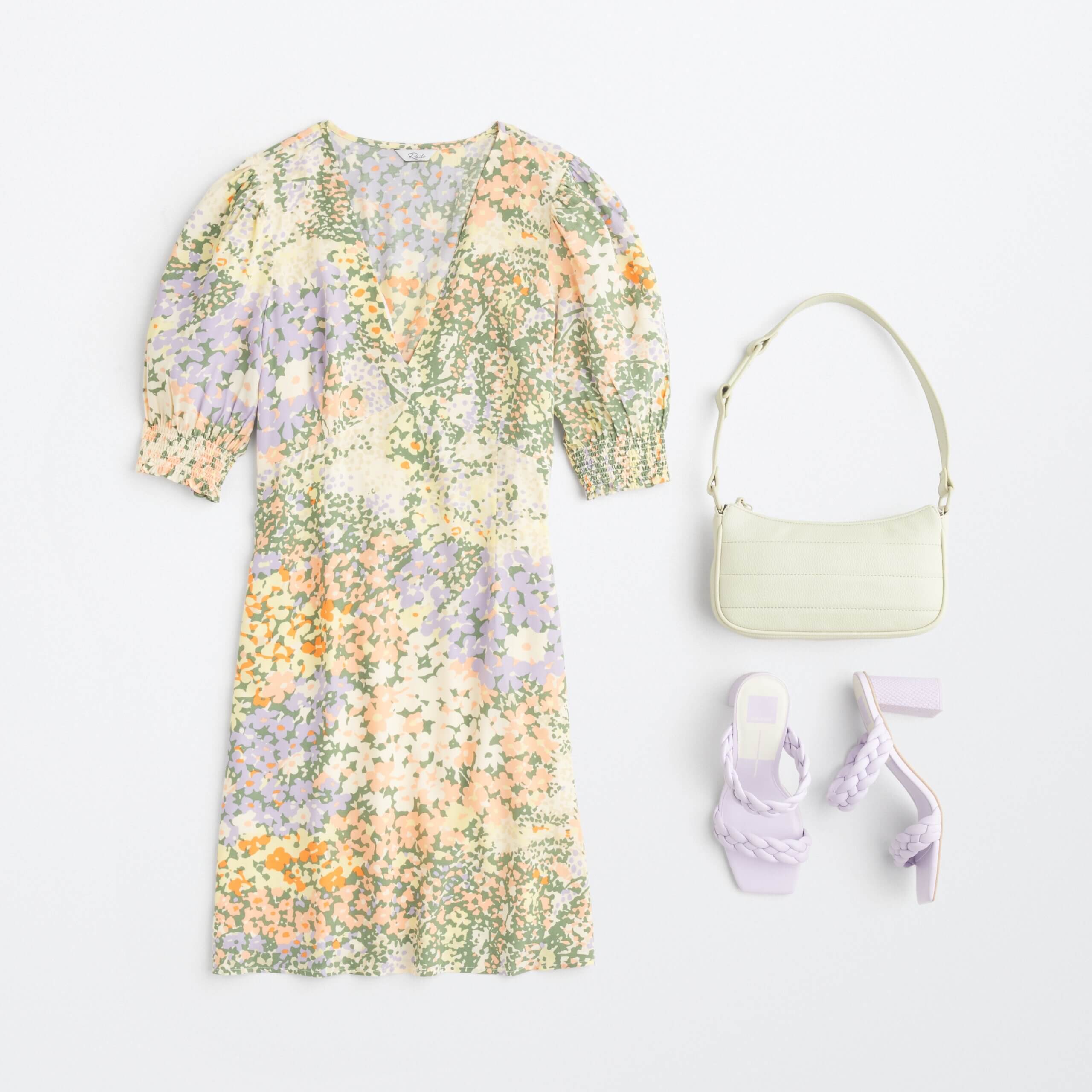Stitch Fix women’s beach cocktail wedding attire with floral puff-sleeve dress, light yellow bag and lilac braided heels.