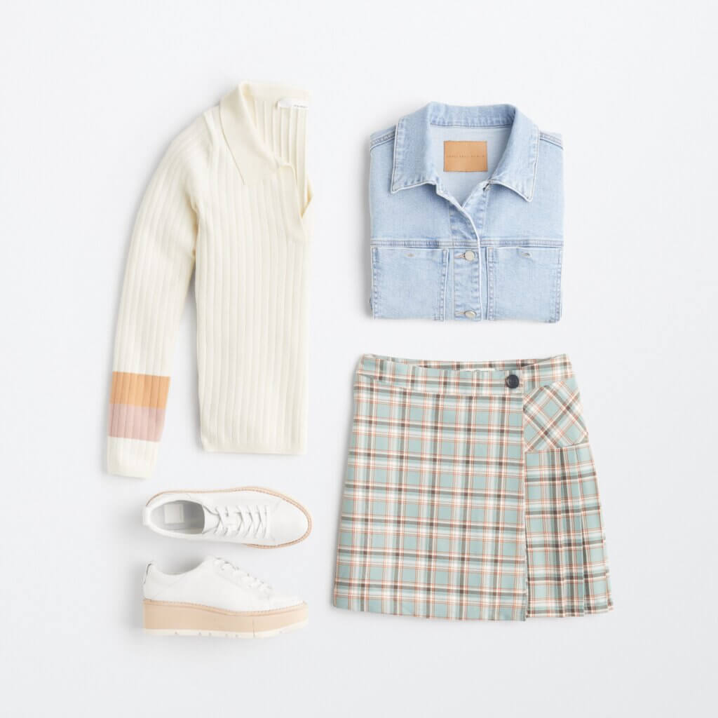 Stitch Fix women's 90s fashion outfit with collared sweater, denim shirt, plaid mini skirt and white platform sneakers.