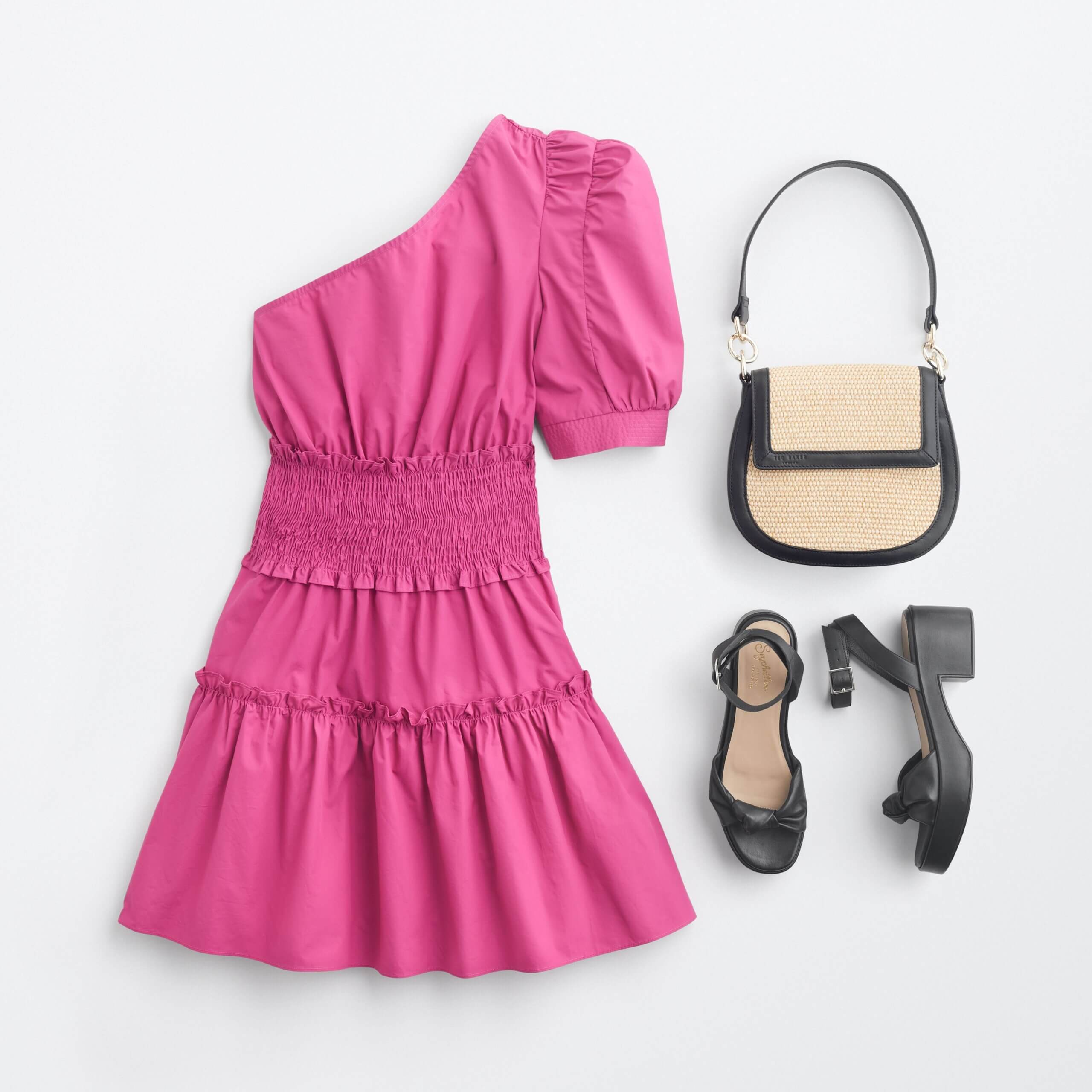Stitch Fix women’s beach semi-formal wedding attire with hot pink one-shoulder dress, tan and black purse and black wedges.