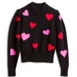Stitch Fix women's black sweater with pink and red hearts.